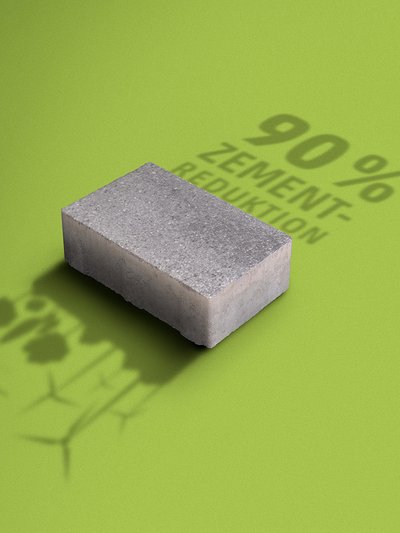 Abbildung eines Pflastersteins und die Bildaufschrift "90% Zementreduktion"